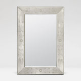 A rectangular wall mirror with a decorative silver-toned frame featuring etched floral and geometric patterns, shown against a light gray background.