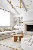 Beautiful rug in living room  On sale at Herringbone and Company 
